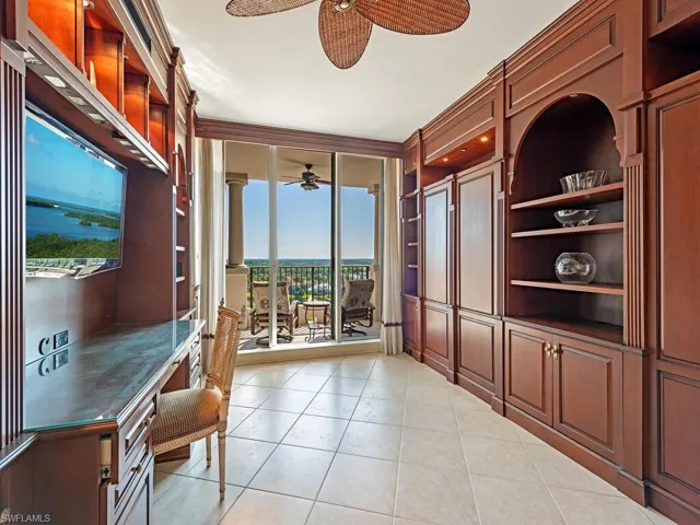 Guest Bedroom 1, currently arranged as an office with a custom, built in, pull down bed