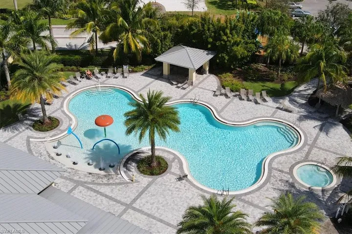 Community pool featuring a gazebo and a patio
