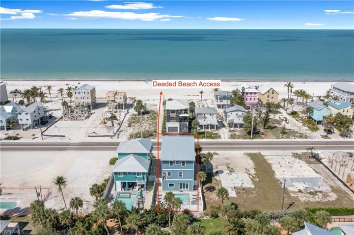 Direct beach access, a private swimming pool, and a multi-story design