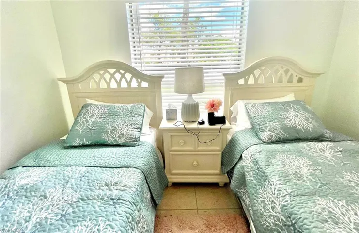Bedroom featuring tile patterned flooring
