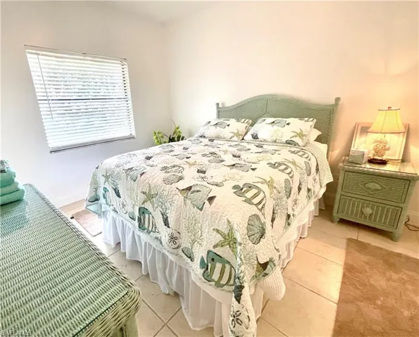 Bedroom featuring light tile patterned floors