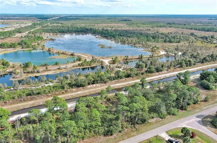 View of property location with a forest