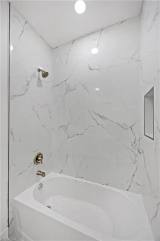 Full bathroom featuring bathing tub / shower combination
