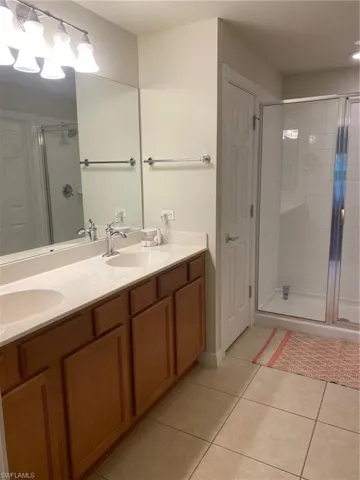 Primary Bath with Two Sinks & Walk-In Shower