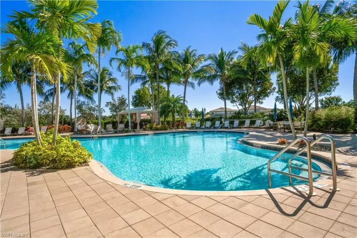 Community pool featuring a patio area and a gazebo