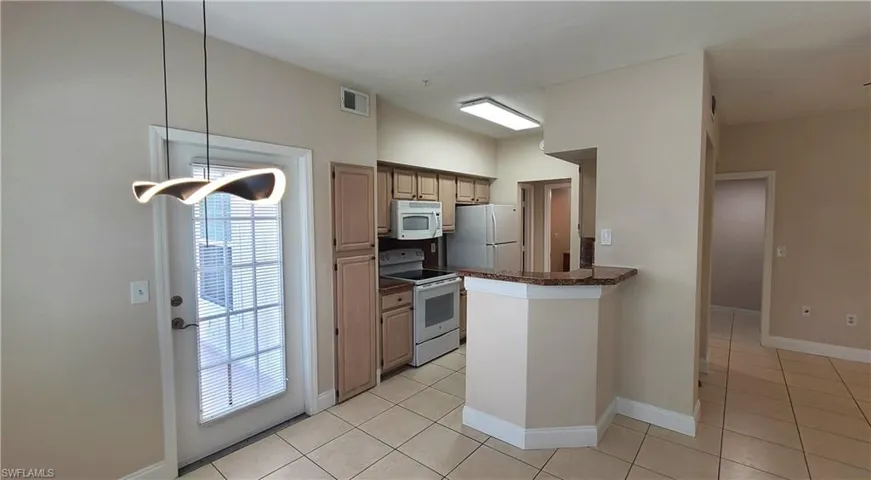 View from dining area to kitchen.