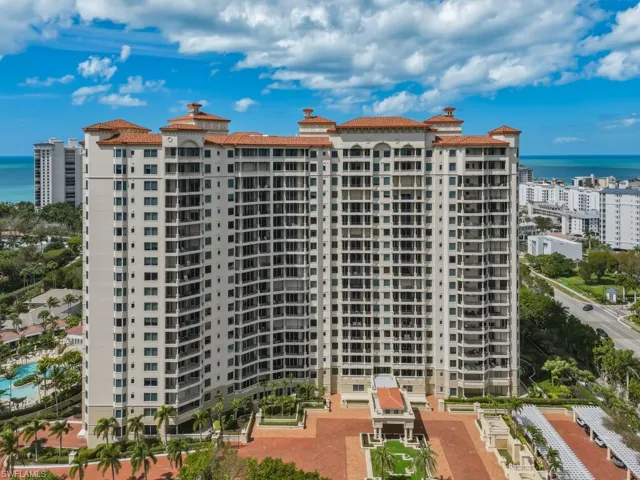 View of building complex with a water view