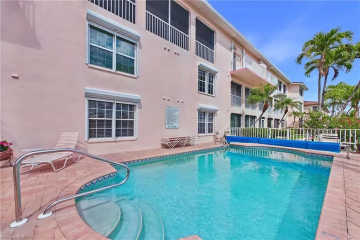 View of heated swimming pool with patio surround