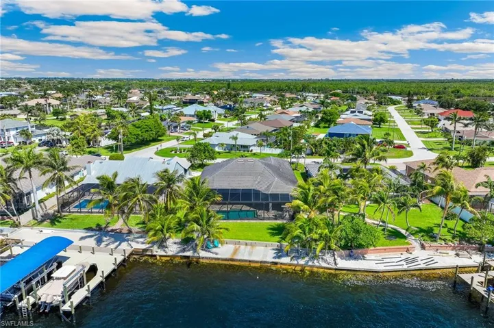 Aerial view of residential area with a nearby body of water
