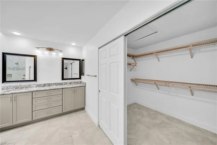 Bathroom with vanity and walk in shower