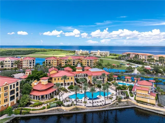 Bird's eye view of a pool and a large body of water