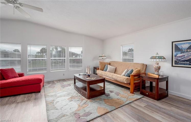 Beautiful floors and freshly painted while walls throughout home