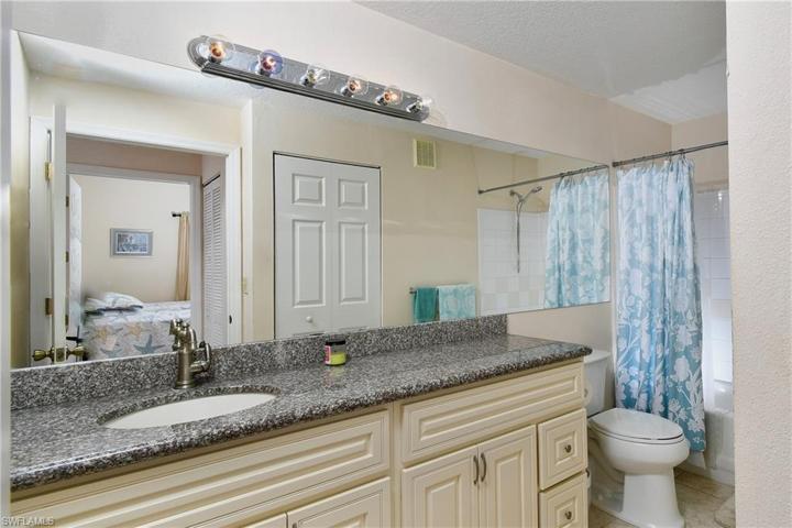 Guest bath with large vanity and linen closet