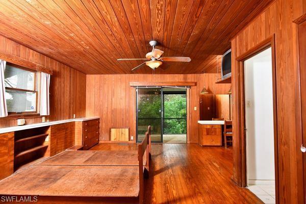 Oversized master bedroom offers custom built-in dressers & vanity