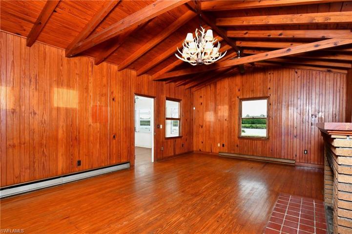 Offers exposed beams with hardwood throughout