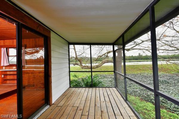Side and rear screened porch.