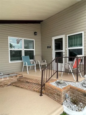 View of snow covered property entrance