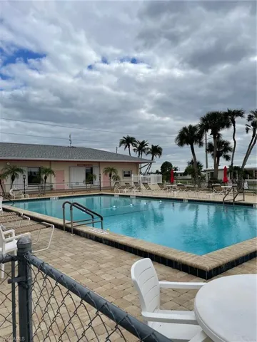 View of swimming pool with a patio