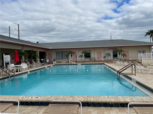 View of pool with a patio area