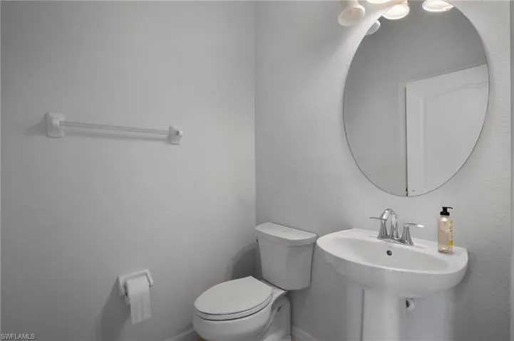 Bathroom featuring a sink and toilet