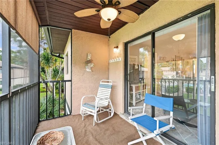 Screened lanai with view of the pool