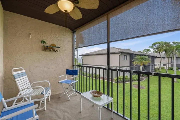 Screened lanai with view of the pool
