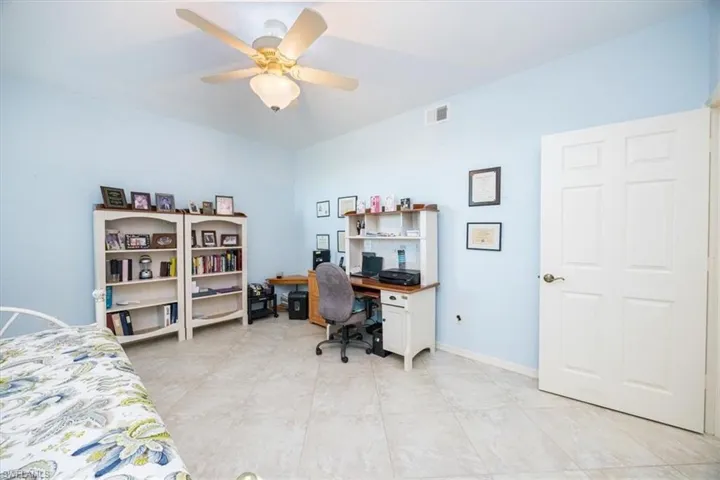 Bedroom featuring ceiling fan
