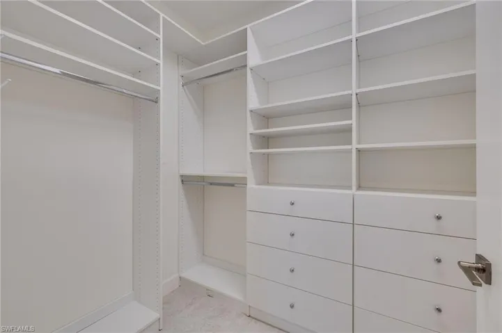 Primary Bedroom custom built in closet