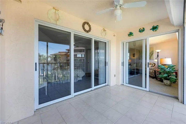 View of patio with ceiling fan