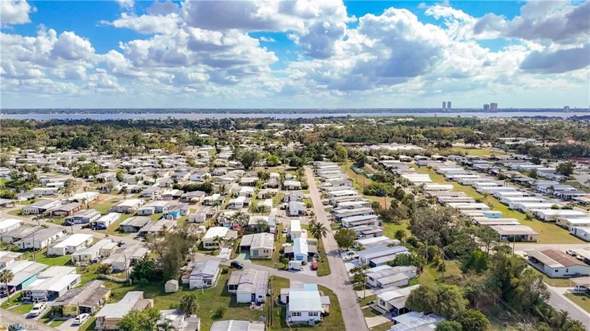 Birds eye view of property with a residential view