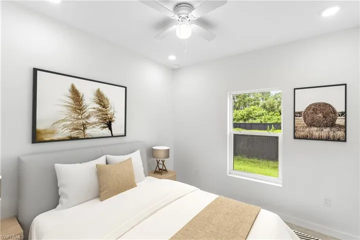 Bedroom featuring recessed lighting and ceiling fan