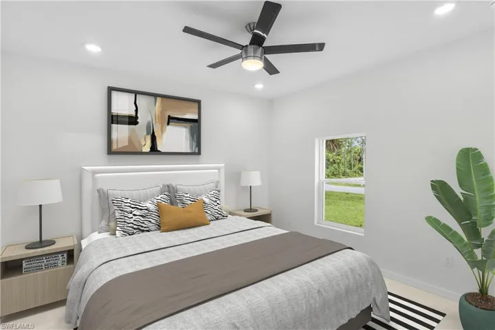 Bedroom with recessed lighting and a ceiling fan