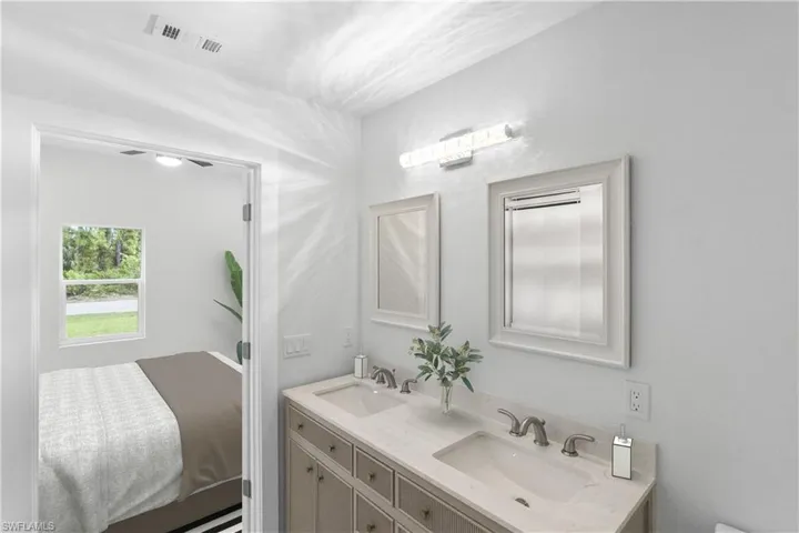 Bathroom featuring double vanity