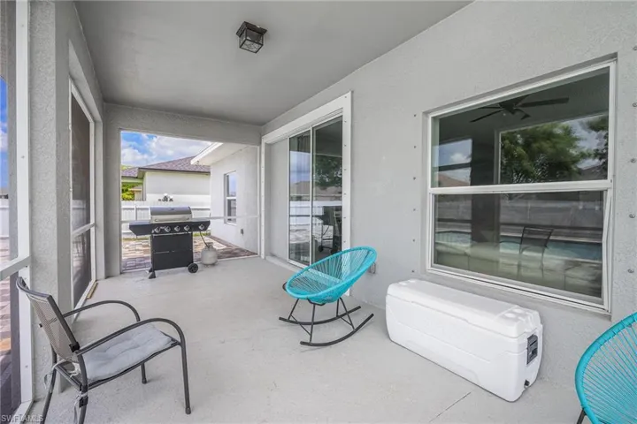 Covered patio space featuring a concrete floor and screened enclosure