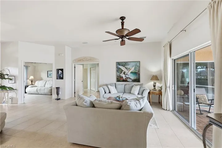 Living room featuring ceiling fan
