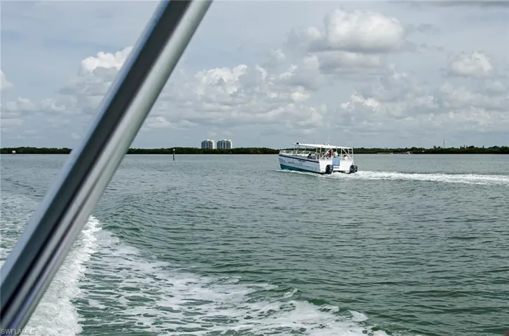 Water view featuring a dock