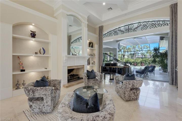 The grand fireplace is one of the many details to love about this home.