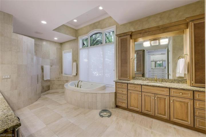 Luxurious en suite bath feels like an upscale spa.