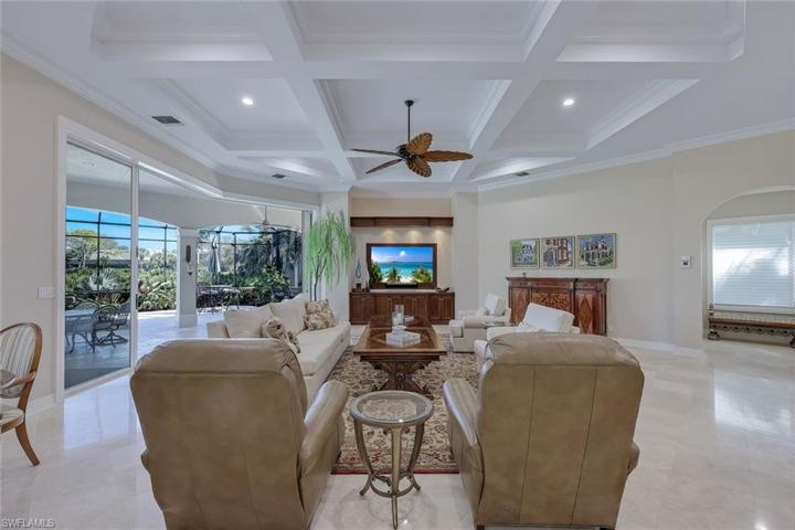 Comfy family room open to the lanai and the kitchen.