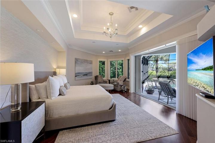 Mornings are meant to be enjoyed. The outdoor space is easily accessible from the primary bedroom.