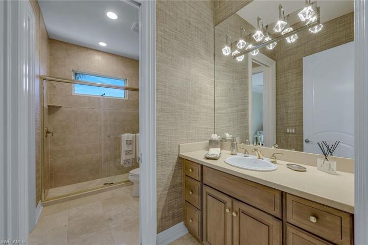 Guest bathroom with walk in shower.