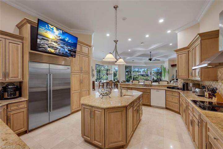 Notice the television above the refrigerator; watch your favorite cooking show and create culinary treats for your guests.