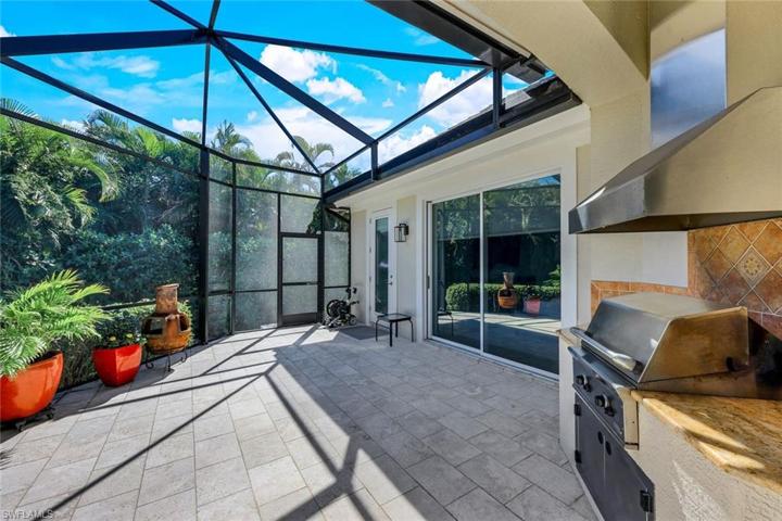 THE perfect home for entertaining your family and friends! Outdoor kitchen is just off the family room.