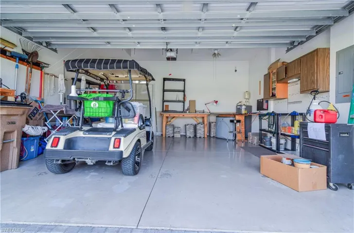 Garage featuring electric panel