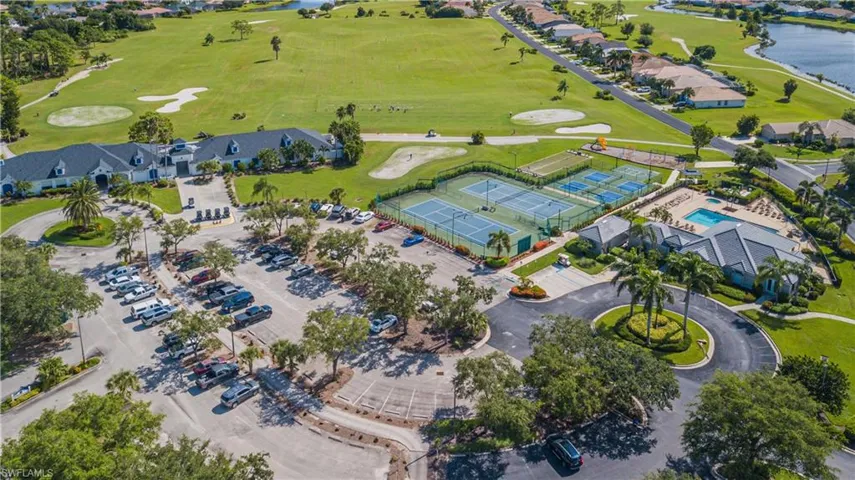 Aerial view featuring tennis courts