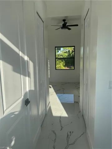Corridor with tile floors