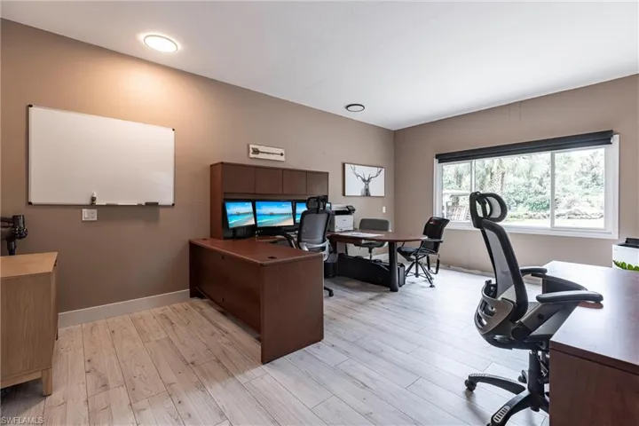 Outside Office featuring light wood-style floors and recessed lighting