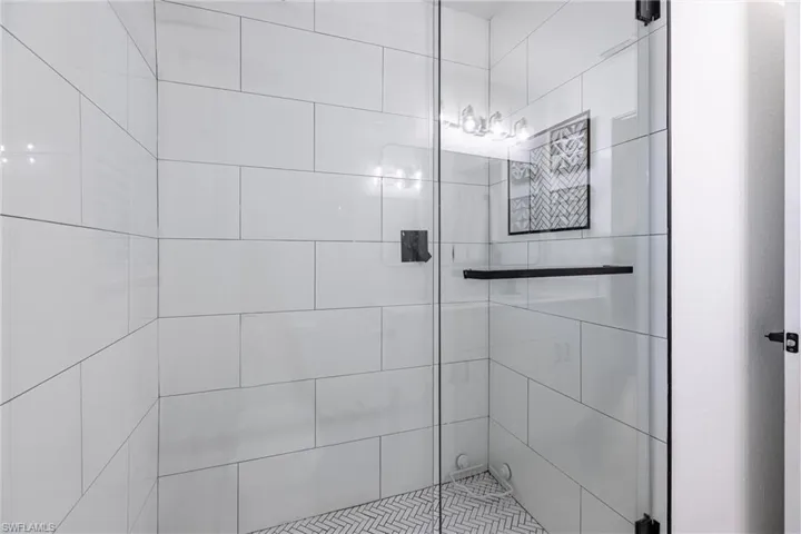 Bathroom featuring a shower stall