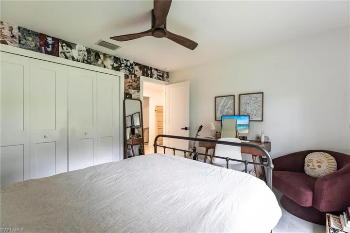 Bedroom with a closet and ceiling fan