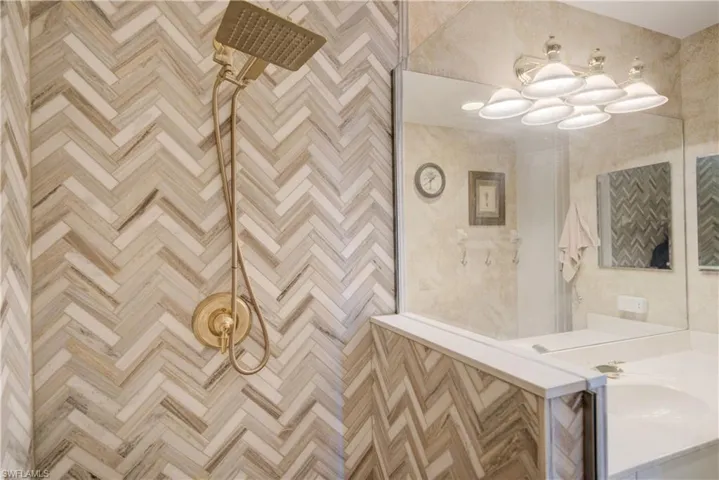 Bathroom with vanity and walk in shower